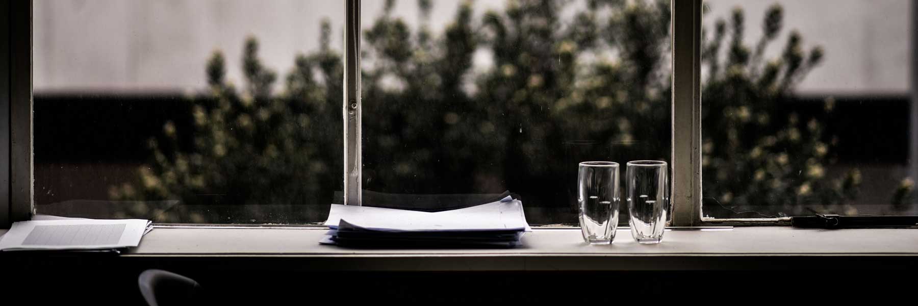 Desk with documents on top.